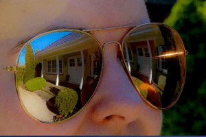 Reflectie in een zonnebril