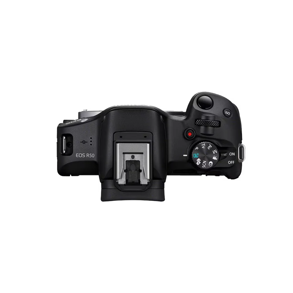 Canon EOS R50 review: is dit een goede camera voor beginners? 2 Bovenkant van de Canon EOS R50 met programmakeuzewiel en bedieningsknoppen